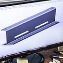 The bracket shown as a 3d model on a computer screen