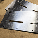 Close up of two unformed brackets