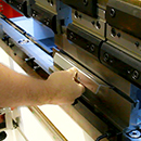 the bracket being formed by the press brake