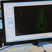 The outlines of a part shown on a computer screen