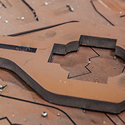 Close up on one of the parts on top of the sheet